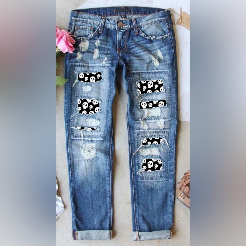 Distressed Blue Jeans with Skull Patches
